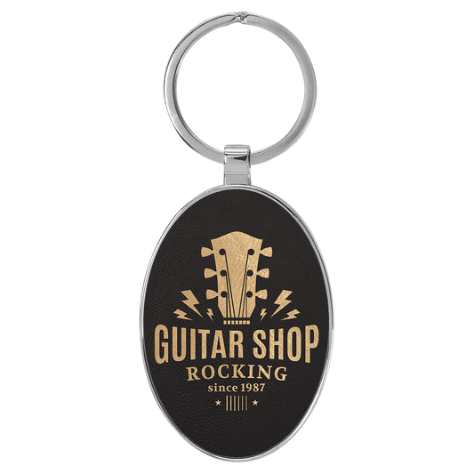 Engravable Leatherette/Metal Black/Gold Oval Keychain - 3" x 1 3/4"
