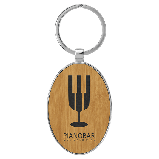 3" x 1 3/4" Laserable Leatherette/Metal Bamboo Oval Keychain